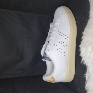 # 129 Adidas White and Gold Sneakers